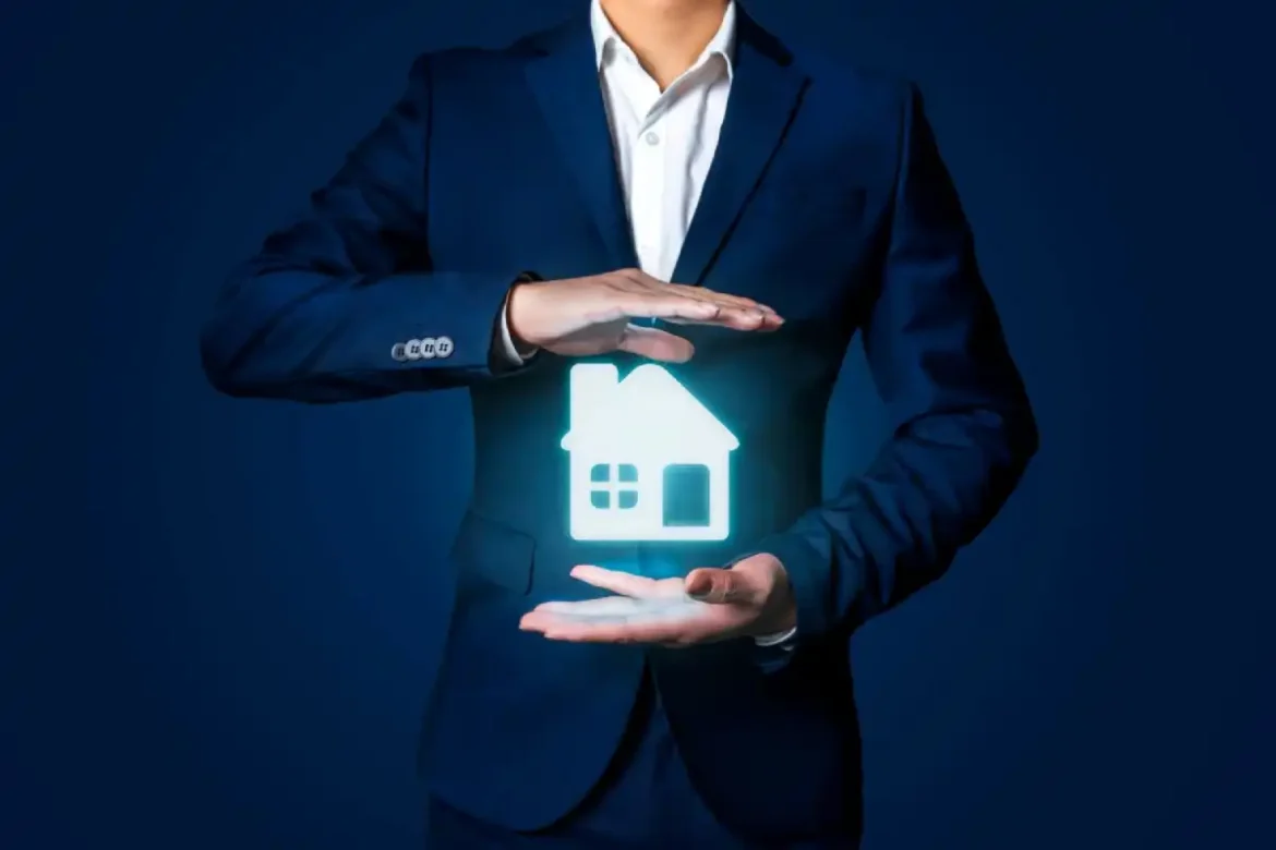 businessman protecting digital house icon with hands